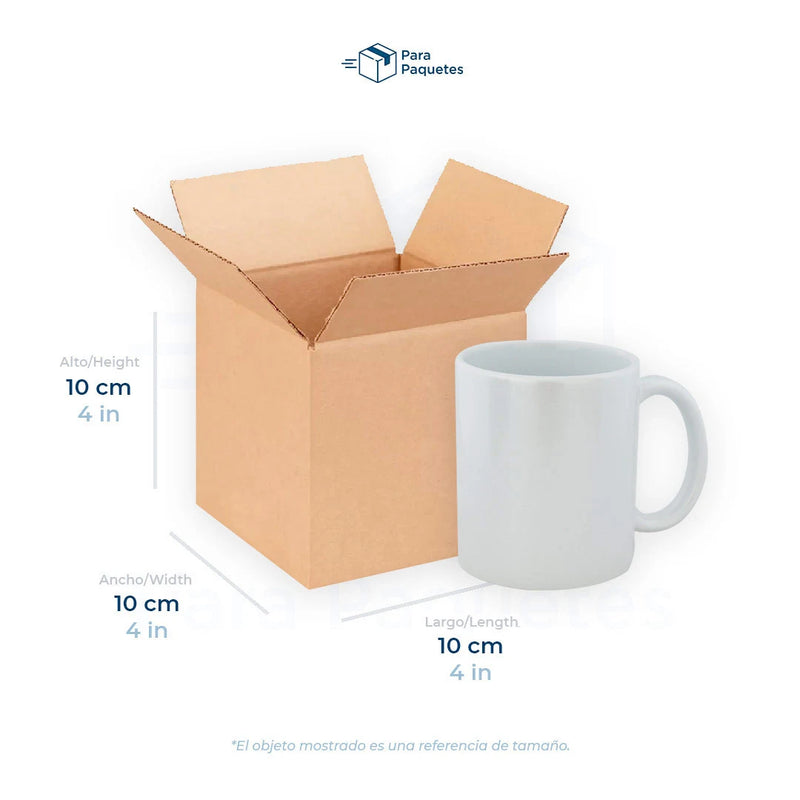 Medida de caja de cartón, 10 x 10 x10 cm, con taza como referencia de tamaño.